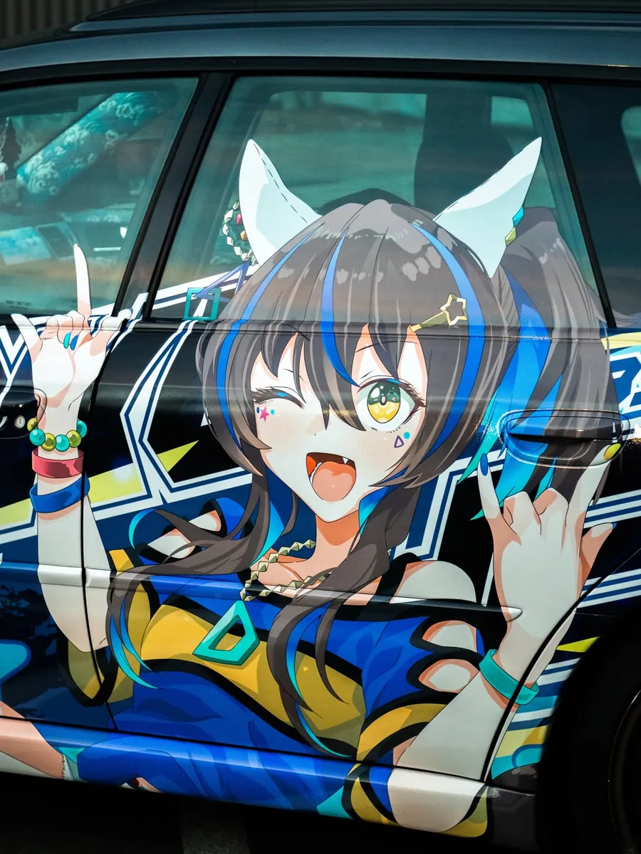 Daitaku Helios from Uma Musume on the side of a Subaru wagon