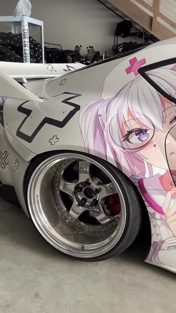 White Toyota GR Supra with the outXlove anime livery