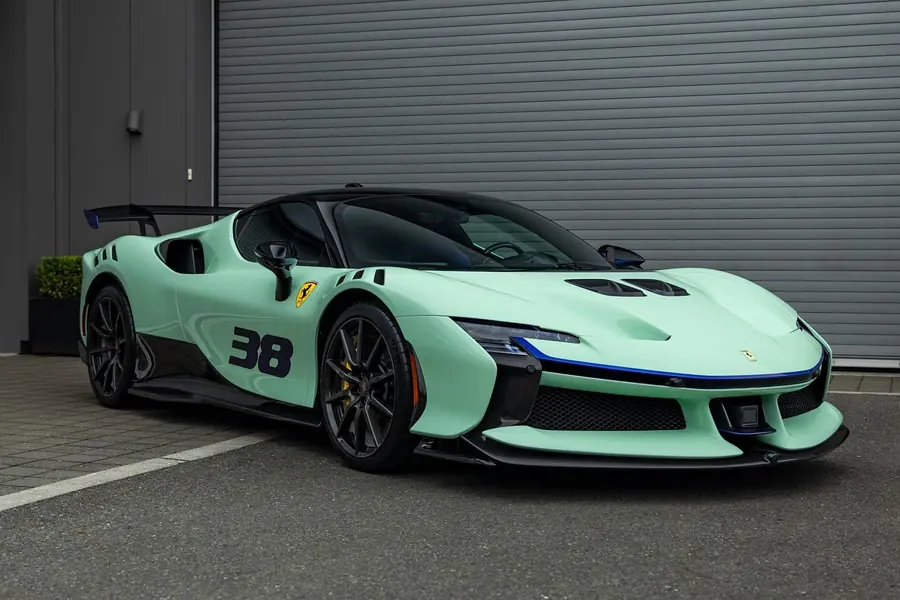 Mint Ferrari SF90 XX with full body clear PPF outside the EMWRAPS shop