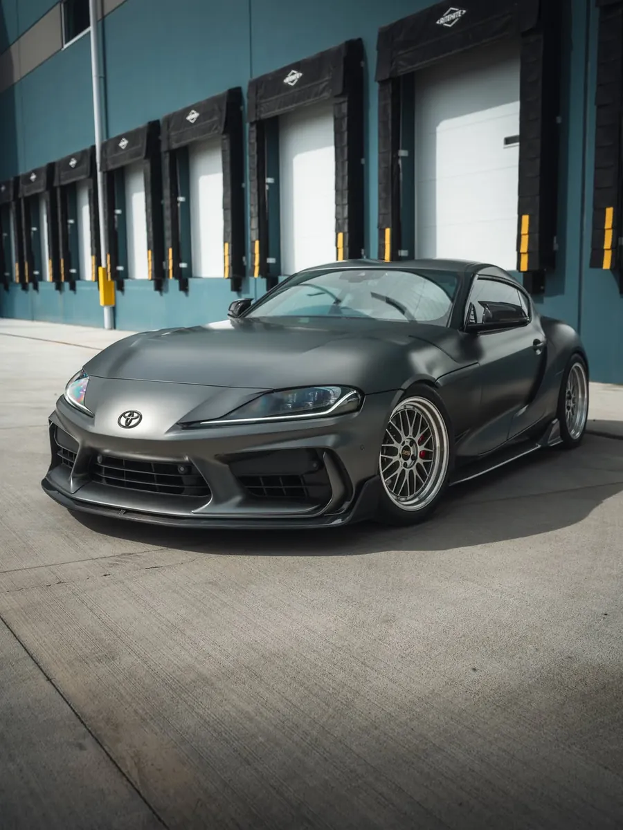 Toyota GR Supra in satin dark grey color PPF with silver mesh wheels