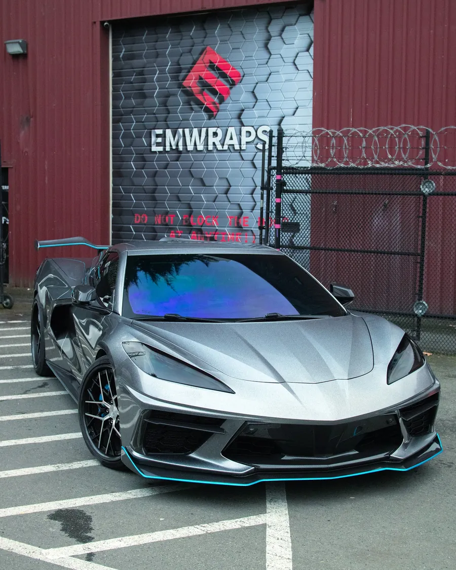 Corvette C8 70th Anniversary in Colorful Silver Star color PPF in front of the EMWRAPS door