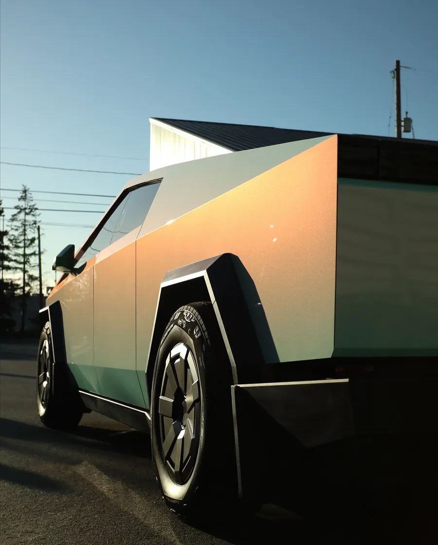 Tesla Cybertruck in Peachy Aqua color-shift PPF glowing peach and aqua in low sun