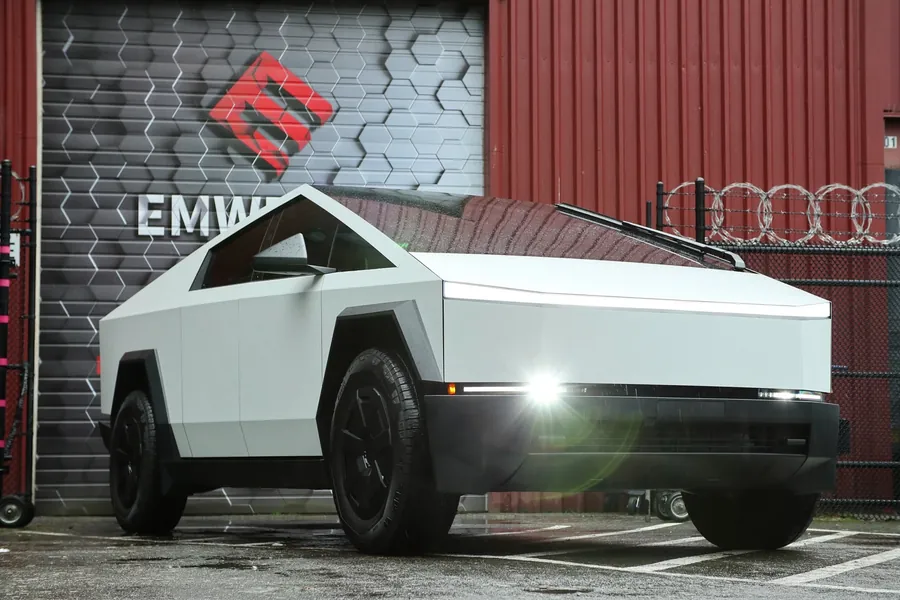 Tesla Cybertruck in matte ceramic white color PPF in front of the EMWRAPS door