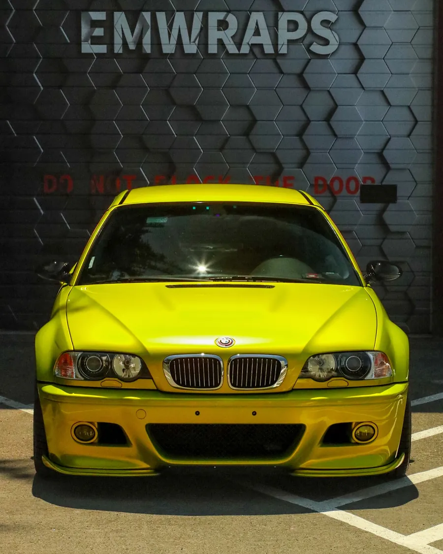 E46 BMW M3 in Golden Yellow color PPF in front of the EMWRAPS door